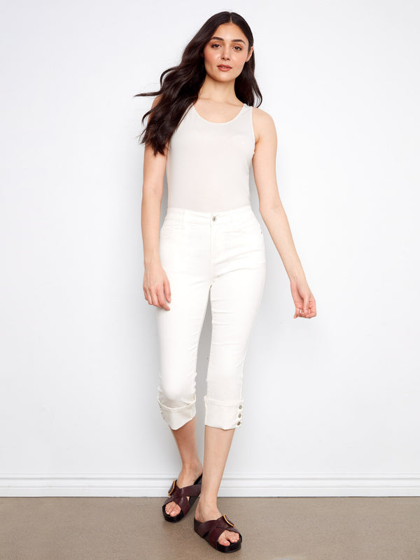 White cropped jeans in stretch twill fabric with a slim fit and snap button cuffs, featuring a regular rise by Charlie B.