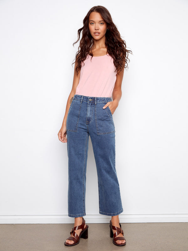 These jeans feature a straight fit, offering a classic silhouette for versatile styling by Charlie B.