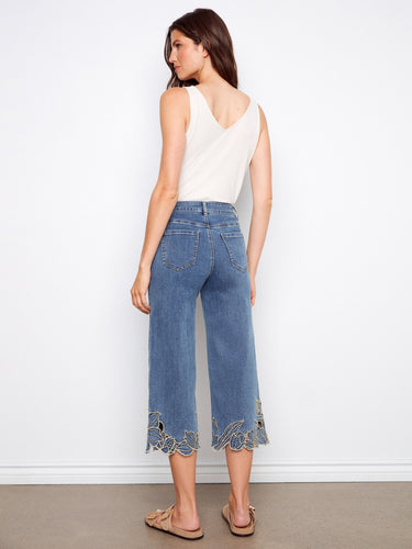 Showcasing a five-pocket design, these cropped length jeans offer versatility and functionality for any casual outing by Charlie B.