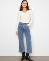 Blue cropped jeans with wide legs and patch pockets, crafted from stretch denim for comfort by Charlie B.