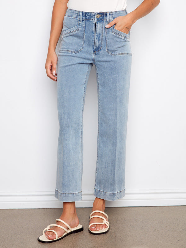 These cropped length jeans offer a modern twist on classic denim, ideal for casual outings. Designed with flair by Charlie B.
