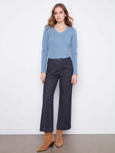 Trendy cropped length jeans with a wide leg silhouette, adding flair to your wardrobe. Created by Charlie B.