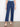 Cropped indigo jeans with stretch denim, perfect for versatile styling by Charlie B.