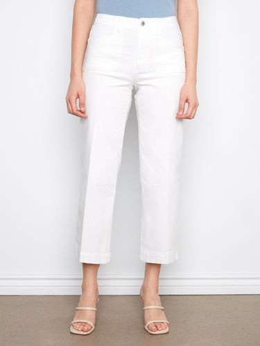 These white jeans showcase rectangular patch pockets, offering a blend of practicality and fashion by Charlie B.