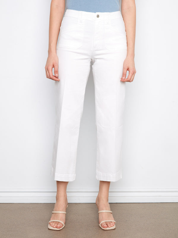 These white jeans showcase rectangular patch pockets, offering a blend of practicality and fashion by Charlie B.