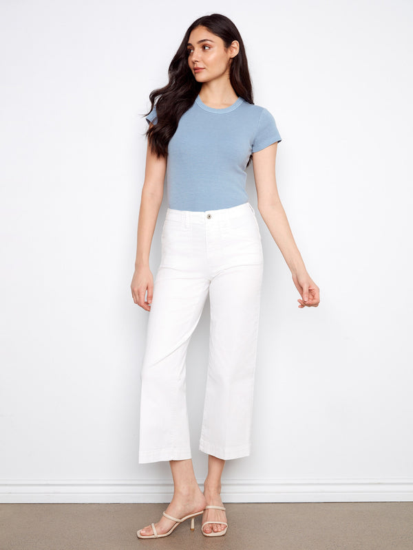 Experience the chic look of these white cropped jeans with their regular rise fit, ideal for any casual outing by Charlie B.