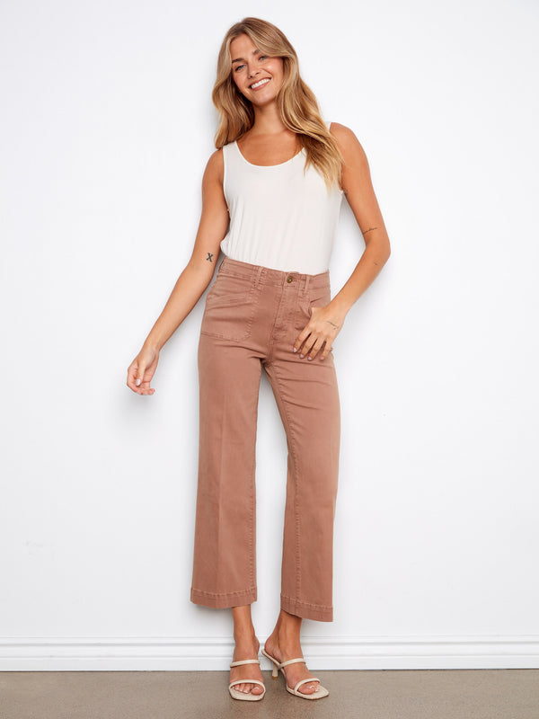 These pants feature a wide leg design that offers a relaxed and stylish fit, perfect for any casual outing. By Charlie B.
