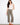 These pants feature a wide leg design, offering a chic and modern look for any occasion. Crafted with comfort in mind by Charlie B.