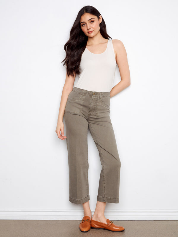 These pants feature a wide leg design, offering a chic and modern look for any occasion. Crafted with comfort in mind by Charlie B.