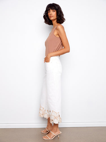 The wide fit of these white jeans ensures a relaxed yet chic silhouette for versatile styling by Charlie B.