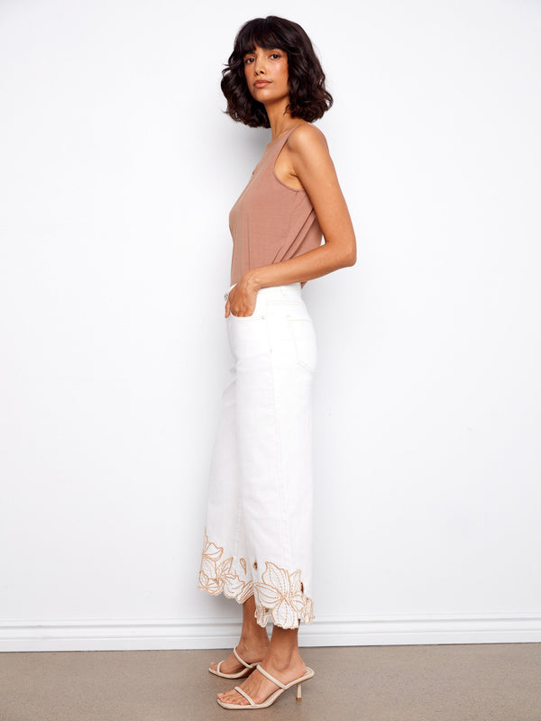The wide fit of these white jeans ensures a relaxed yet chic silhouette for versatile styling by Charlie B.