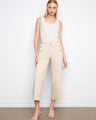 Beige cropped pants featuring a wide leg design with elegant side button details, crafted from stretch twill fabric by Charlie B.