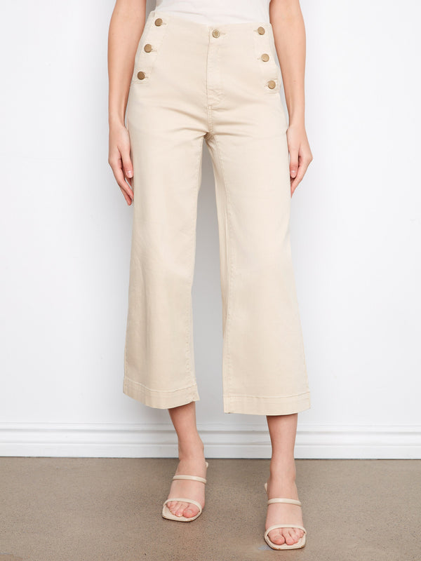 These chic beige pants offer a flattering cropped length and regular rise, complete with slash pockets for added style by Charlie B.
