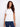 A versatile white tee with a crew neckline that pairs well with jeans or skirts for any occasion. Designed by Charlie B.