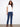 Chic and cozy white top highlighting cuffed short sleeves, ideal for both layering or standalone wear. By Charlie B.