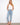 Light blue jeans with a slim fit, featuring a five-pocket design and cuffed hem for style by Charlie B.