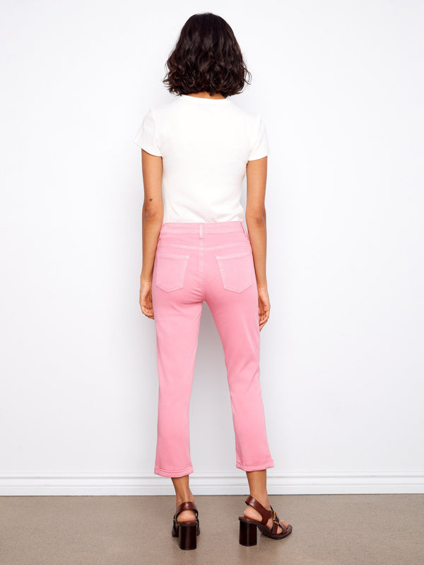 Crafted in stretch twill, these pink cropped pants deliver both comfort and chic appeal for any occasion. By Charlie B.