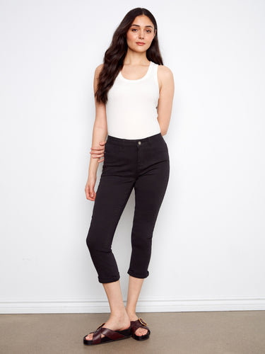 Designed with a practical five-pocket design, these pants offer both fashion and functionality by Charlie B.