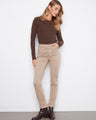 These pants feature a slim leg design, offering a sleek and modern look for any occasion by Charlie B.