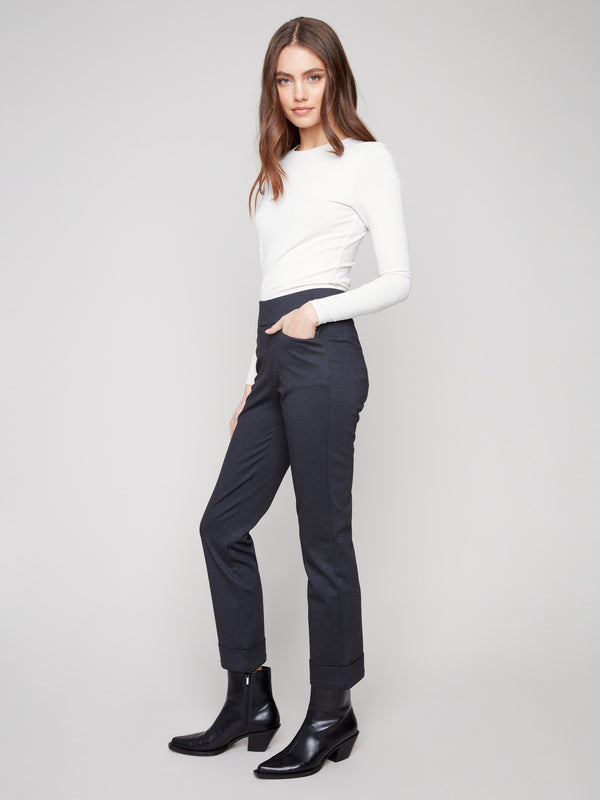 Experience comfort with the stretch fabric of these navy ponte pants, complete with cuffed hems by Charlie B.