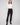 Black ponte pants featuring a straight leg design and cuffed hems, crafted for style and comfort by Charlie B.