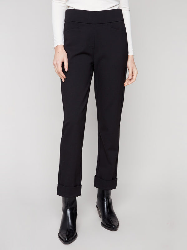 These ankle-length black pants include welt pockets on each side, adding both function and flair by Charlie B.