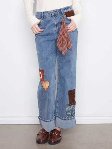 Complete with five pockets, these versatile jeans offer both style and functionality for everyday wear by Charlie B.