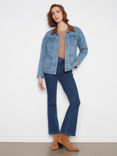 This denim jacket has a button-front closure for easy wear and versatile styling options. By Charlie B.