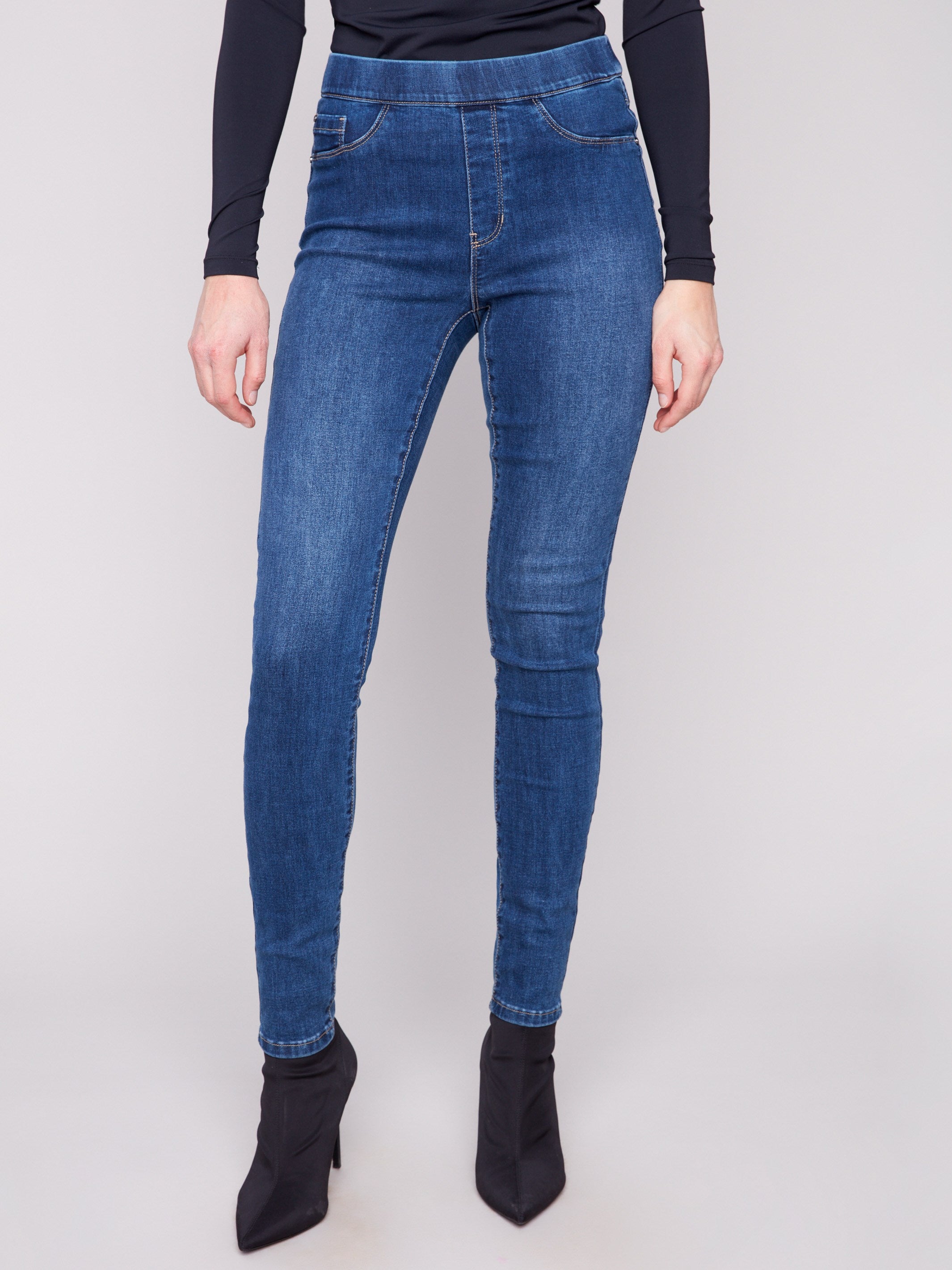 These chic pull-on pants offer a comfortable waistband in stretch denim material by Charlie B.