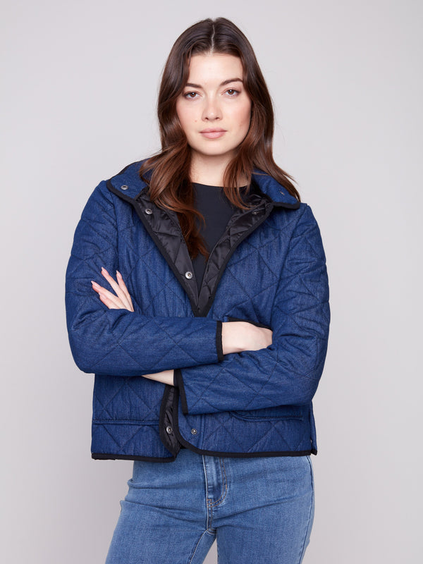 Elegant blue quilted jacket with practical side patch pockets, ideal for everyday wear by Charlie B.