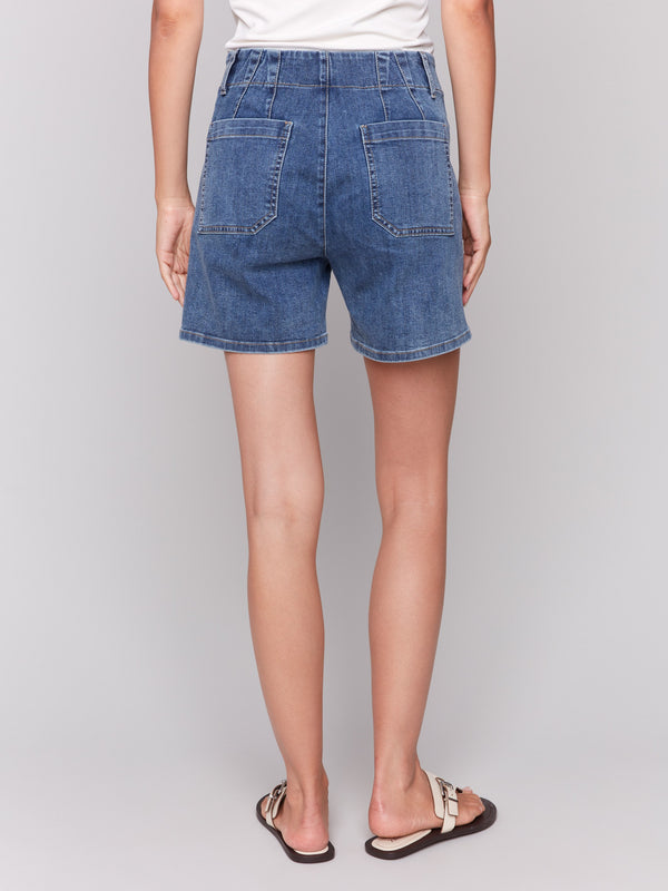 Denim shorts in medium blue with belt loops by Charlie B.