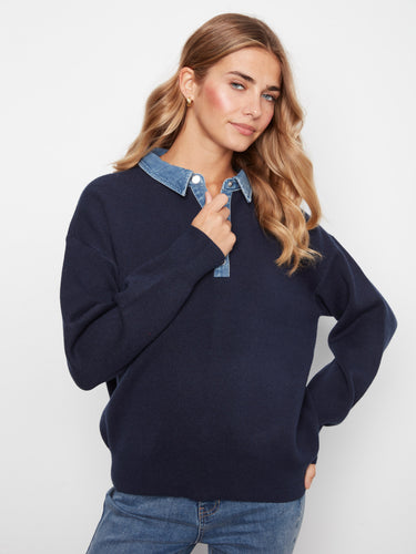 Stylish half-snap denim placket on a navy sweater adds an elegant touch to this comfortable piece. By Charlie B.