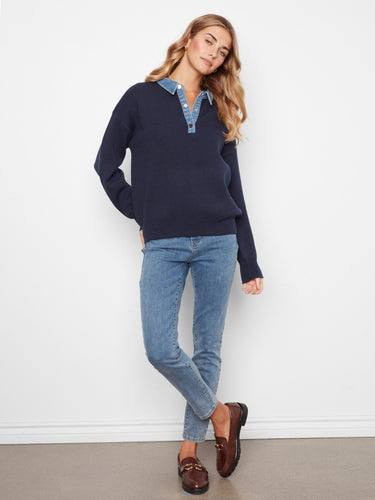 Relaxed fit navy sweater with denim accents offers comfort and style, ideal for everyday wear. By Charlie B.