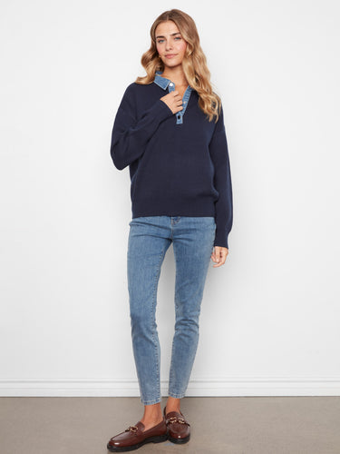 The combination of ribbed cuffs and hem provides subtle texture to this classic navy and denim ensemble. By Charlie B.