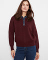 Stylish denim shirt collar adds a chic touch to this sweater, perfect for casual outings. By Charlie B.