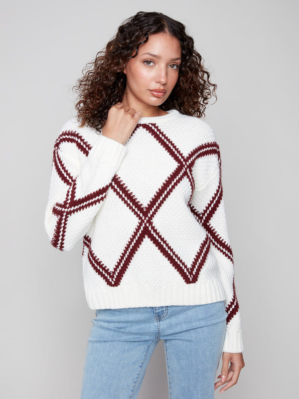 Elegant white sweater with cabernet diamond intarsia knit, featuring long sleeves and a cozy feel by Charlie B.