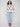 Chic white sweater adorned with a cabernet diamond motif, offering comfort and style through its drop shoulder design by Charlie B.