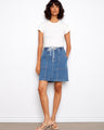 Denim skirt featuring patch pockets, a perfect blend of style and functionality by Charlie B.