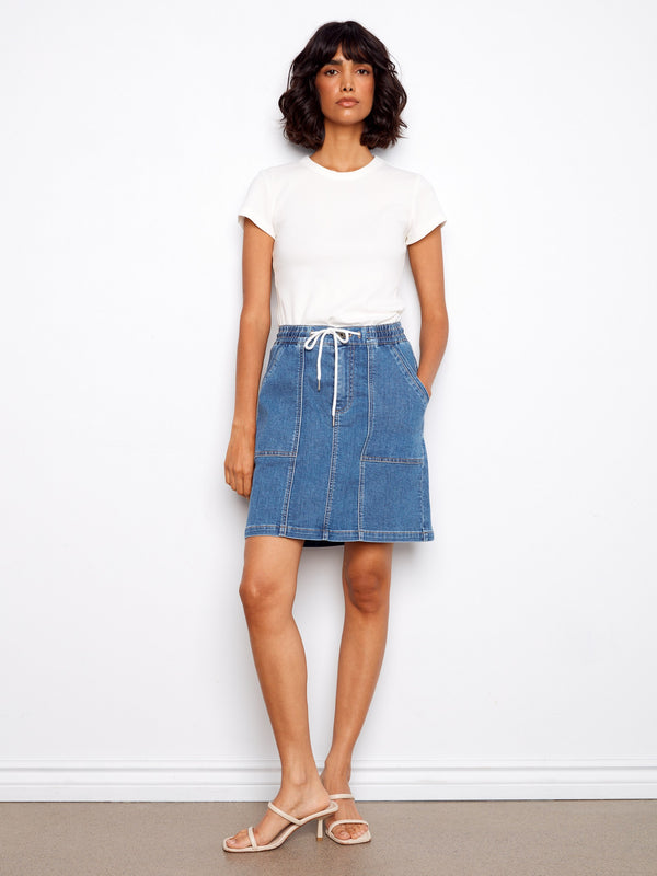 Denim skirt featuring patch pockets, a perfect blend of style and functionality by Charlie B.