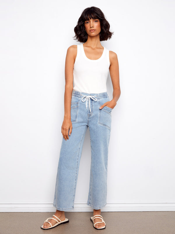 These jeans feature a wide leg fit that adds a relaxed vibe to any outfit. Perfect for casual days out. By Charlie B.