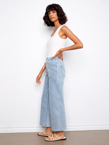 Designed with patch pockets, these jeans offer both style and functionality for everyday wear. By Charlie B.