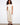 Beige wide leg twill pants featuring a cropped length and styled with casual sandals, perfect for summer days by Charlie B.