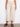 These beige pants offer a regular rise fit with patch pockets, combining comfort and style effortlessly by Charlie B.
