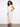 Crafted from stretch twill fabric, these beige wide leg pants ensure all-day comfort and ease of movement by Charlie B.