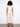 Stylish beige wide leg pants designed with functional patch pockets, adding practicality to your wardrobe by Charlie B.