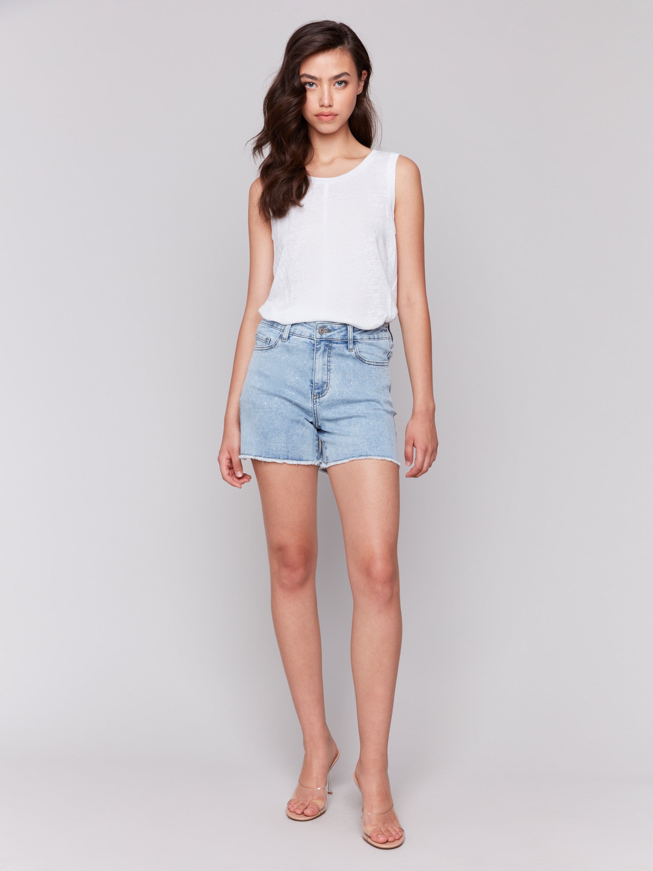 Denim shorts featuring a stylish frayed hem, perfect for casual outings by Charlie B.