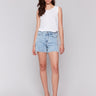 Denim shorts featuring a stylish frayed hem, perfect for casual outings by Charlie B.
