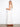 Chic natural maxi dress showcasing an embroidered bodice and timeless V-neckline by Charlie B.
