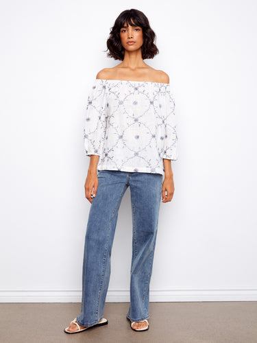 Casual yet chic top featuring 3/4 sleeves and a comfortable fit in breathable 100% cotton. By Charlie B.
