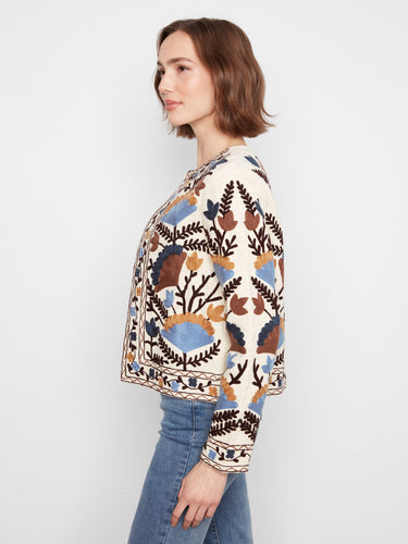 Chic open front closure on this black jacket highlights its intricate floral embroidery and relaxed fit by Charlie B.